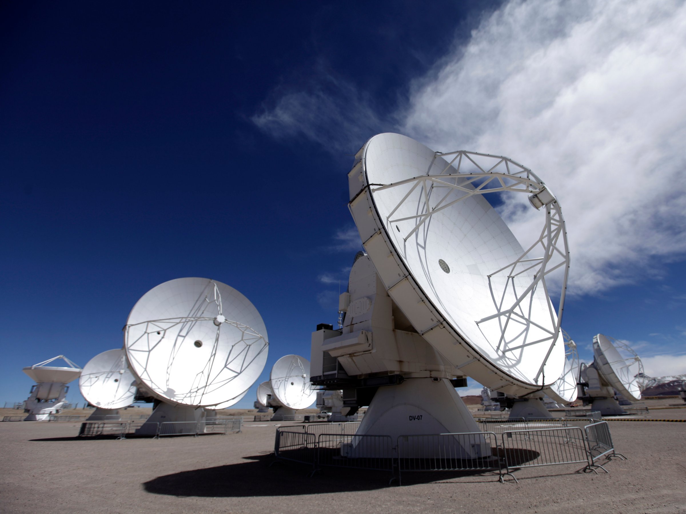 In this Sept. 27, 2012 photo, radio antennas face the sky as part of one of the worlds largest astronomy projects, the Atacama Large Millimeter/submillimeter Array (ALMA) in Chajnator in the Atacama desert in northern Chile.