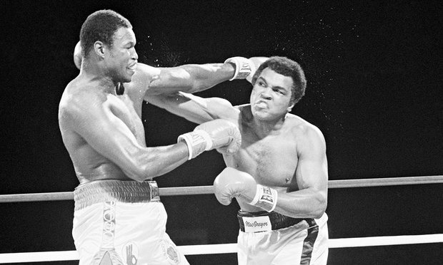 Heavyweight champion Larry Holmes and Muhammad Ali exchange blows during their world heavyweight title match in 1980. Photograph: Bettmann/CORBIS