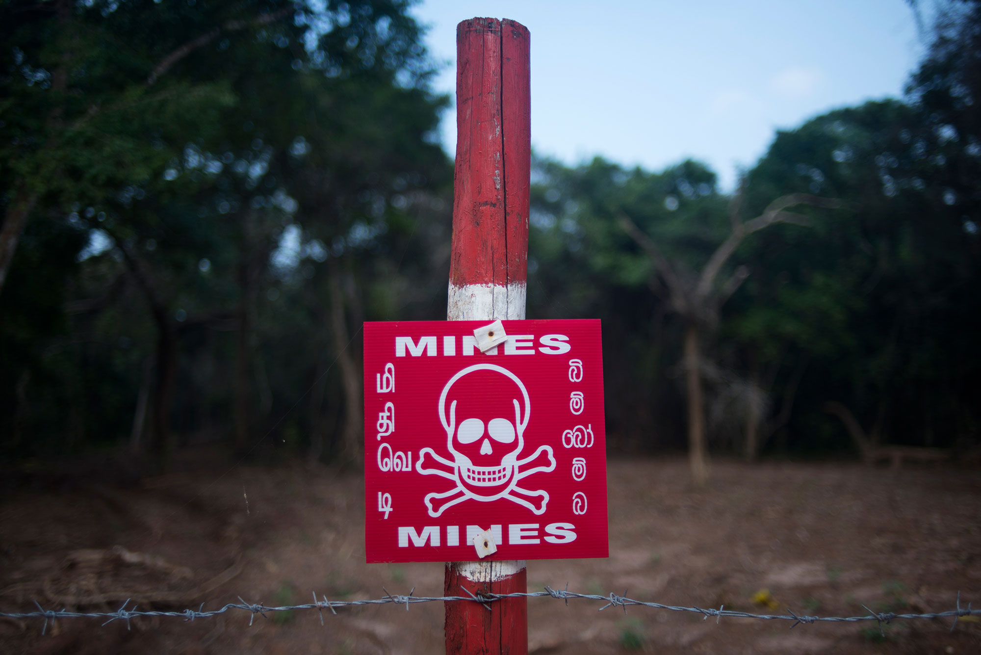 A sign warns of hidden landmines in Mullivaikal on the northeastern coast of Sri Lanka. 