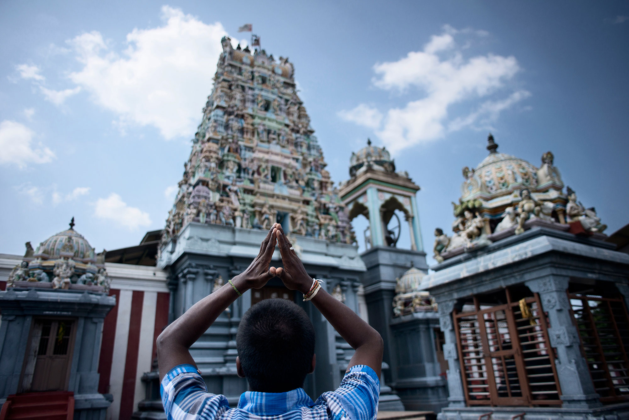 A Tamil devotee prays at a Hindu temple in Mannar district, in Sri Lanka's northwest. 
