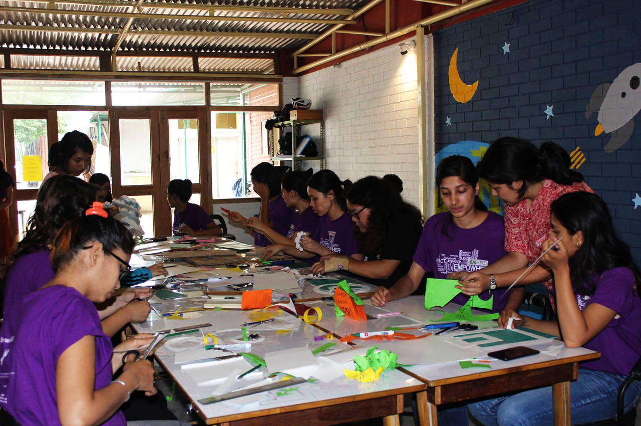 Pic. The cohort of girls busy making the lamps