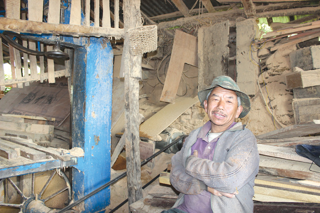 ENTREPRENEUR AT EPICENTRE: Resh Bahadur Ghale has been operating his saw mill non-stop since electricity was restored in Barpak in April, making doors and windows for the reconstruction of village houses.