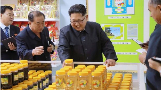 The North Korean leader regularly visits food production facilities - here inspecting cornstarch and cookies at a factory in Pyongyang