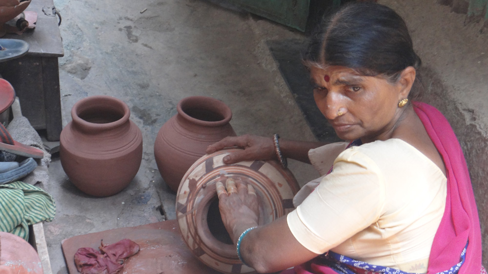 Many artisans work in the slums to support families living in far off villages 
