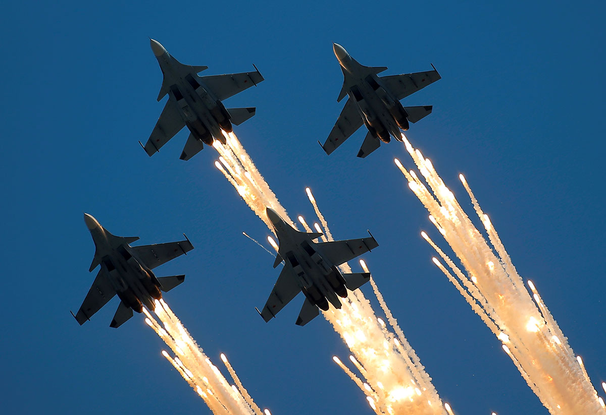 Sukhoi Su-30SM jet fighters of the Sokoly Rossii (Falcons of Russia) aerobatic team fly in formation during the International Army Games 2016 in Dubrovichi outside Ryazan, Russia. 
