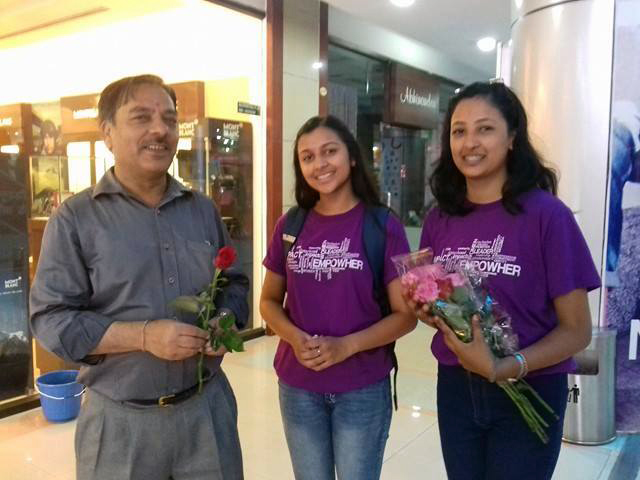 Black lotus group selling off their roses at the City centre.