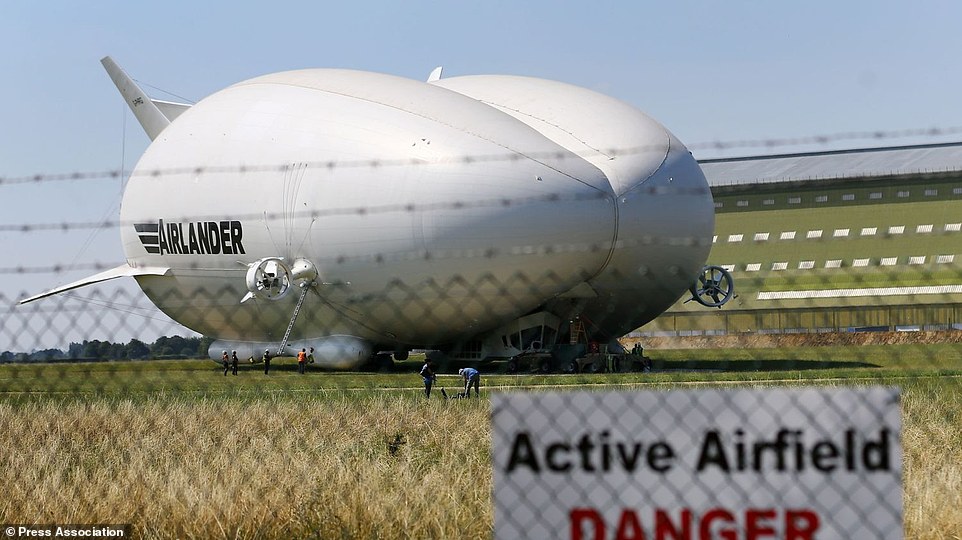Preparations are made for the maiden flight of the Airlander 10, the largest aircraft in the world, at Cardington airfield
