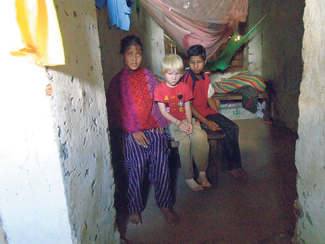 Three students with special needs at their dormitory near a school they attend. (Kalpana)