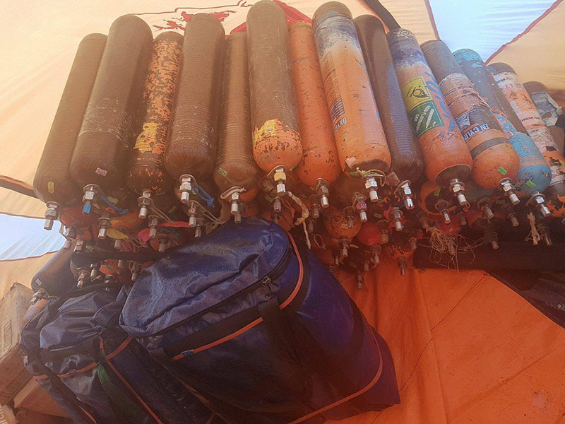 Climbers keep oxygen cylinders ready for the Mt Manaslu climbing at the base camp, in September 2016.