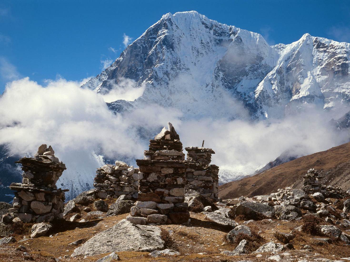 Memorials for climbers lost on Everest Â© Image by Andrzej Stajer / Getty Images