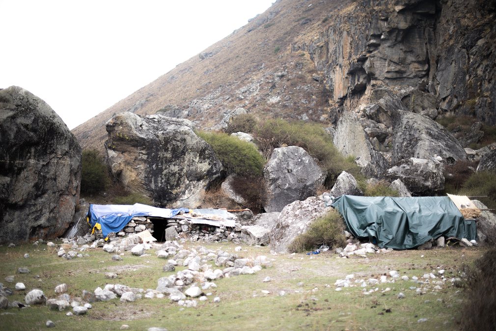 Temporary shelters in front of the caves south of Kyanjin Gompa have provided refuge