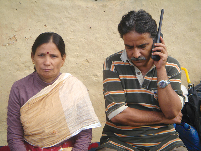 Prachanda speaks on a satellite phone with Sita alongside in Dang in 2005. The phones and pre-paid SIMs were sourced from Thailand by the partyâ€™s procurement chief, Bhakti Prasad Pandey, who died of lung cancer two weeks ago.