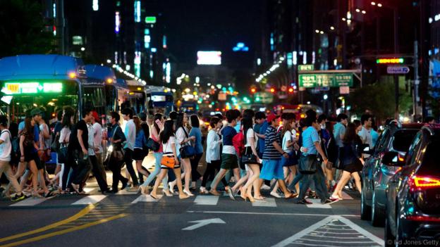Seoul residents live a very fast-paced life (Credit: Ed Jones/Getty)