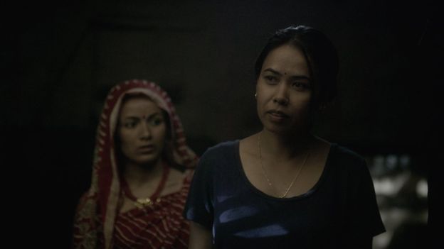 Chandra's estranged wife Durga (right), played by Asha Magarati